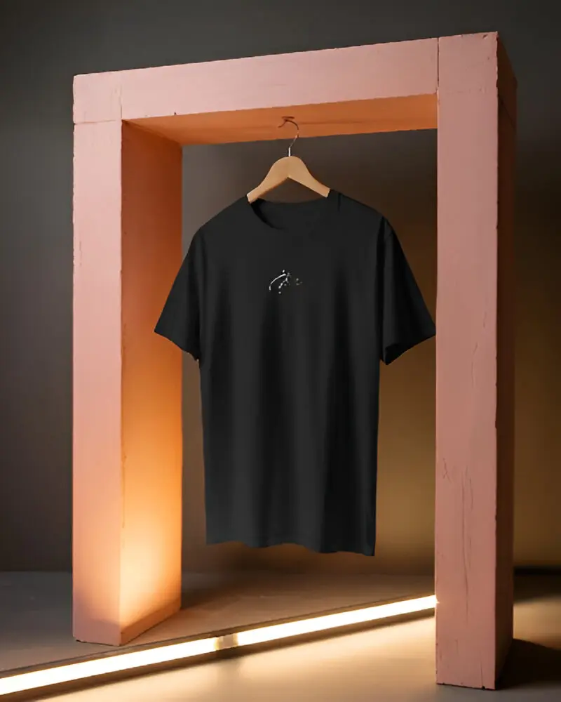 moody-studio-tshirt-mockup-hanging-on-wooden-hanger-in-painted-archway-dramatic-lighting-and-shadow-play-01781 (1).webp